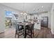 Kitchen and dining area with stainless appliances and a sliding glass door to the patio at 509 Rain Drizzle Ct, Wake Forest, NC 27587