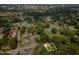 Wide aerial shot showcasing the property within its urban context and nearby cemetery at 517 Bart St, Raleigh, NC 27610