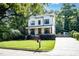 Attractive two-story home with a well-kept lawn, a welcoming porch, and mature landscaping at 517 Bart St, Raleigh, NC 27610