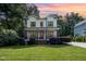 Charming two-story home with a welcoming front porch and well-manicured lawn, perfect for suburban living at 517 Bart St, Raleigh, NC 27610