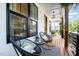 Charming front porch featuring comfortable rocking chairs, a patterned rug, and tasteful decor at 517 Bart St, Raleigh, NC 27610