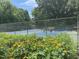 Community tennis courts with vibrant landscaping, offering a scenic view for neighborhood matches at 517 Bart St, Raleigh, NC 27610