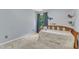 Light blue bedroom with ocean-themed decor, bed, and window with curtains at 5603 Whisperwood Dr, Durham, NC 27713