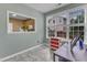 Bright breakfast nook with large windows providing natural light; adjoins the kitchen at 5603 Whisperwood Dr, Durham, NC 27713