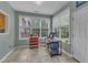Sunny breakfast nook with multiple windows providing natural light and views of the backyard at 5603 Whisperwood Dr, Durham, NC 27713