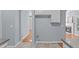 Kitchen space offers ample storage, neutral walls, and an entryway to the living room at 6004 Solitude Way, Durham, NC 27713
