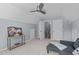 Comfortable and spacious living room has vaulted ceilings and a neutral color palette at 6004 Solitude Way, Durham, NC 27713