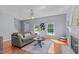 Inviting living room with natural light, comfortable seating, and views of the outdoors at 6004 Solitude Way, Durham, NC 27713