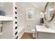 This full bathroom has a shower-tub combo and a single sink at 6313 Belle Crest Dr, Raleigh, NC 27612