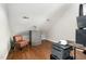 This bonus room features hardwood floors and natural light at 6313 Belle Crest Dr, Raleigh, NC 27612