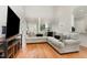 Open-concept living room features hardwood floors and a spacious seating area at 6313 Belle Crest Dr, Raleigh, NC 27612