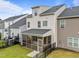 A charming home featuring a screened porch, fenced backyard, and well-manicured lawn, blending comfort and style at 640 Barneswyck Dr, Fuquay Varina, NC 27526
