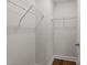 Spacious walk-in closet features built-in shelving and hardwood floors at 640 Barneswyck Dr, Fuquay Varina, NC 27526