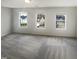 Bedroom featuring ample natural light through large windows at 6701 Winding Arch Dr, Durham, NC 27713
