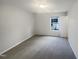 Bright bedroom with window at 6701 Winding Arch Dr, Durham, NC 27713
