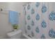 Bathroom with a blue and white floral shower curtain at 705 Harkness Cir, Durham, NC 27705