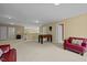 Large bonus room with carpet, seating and a foosball table at 705 Harkness Cir, Durham, NC 27705