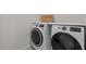 Laundry room area featuring a modern washer and dryer set at 705 Harkness Cir, Durham, NC 27705