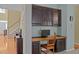 Dedicated home office space with built-in desk and storage provides a functional workspace at 705 Harkness Cir, Durham, NC 27705