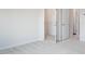 Open closet in a bedroom with white walls and carpet at 732 Suffield Way, Cary, NC 27519
