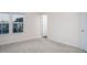 Neutral bedroom with carpet, white walls, and double windows offering natural light at 732 Suffield Way, Cary, NC 27519