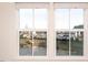 Windows with a view of a pond, trees, and neighborhood at 732 Suffield Way, Cary, NC 27519