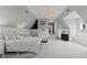Spacious bedroom with neutral colors, decorative chandelier, and beadboard trim at 763 Heritage Arbor Dr, Wake Forest, NC 27587