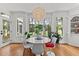 Charming breakfast nook with windows offering great views of the lush backyard at 763 Heritage Arbor Dr, Wake Forest, NC 27587