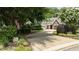 Beautiful home exterior with a well-manicured lawn, stone accents, and an inviting driveway at 763 Heritage Arbor Dr, Wake Forest, NC 27587