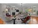 A stylish living room features hardwood floors, a fireplace, and a modern area rug at 763 Heritage Arbor Dr, Wake Forest, NC 27587