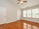 Bedroom with vaulted ceilings, hardwood floors and multiple closets at 7646 Winners Edge St, Raleigh, NC 27617