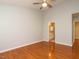 Bedroom with hardwood floors and a view of the bathroom at 7646 Winners Edge St, Raleigh, NC 27617