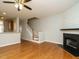 Spacious living room features a fireplace and access to stairs and the kitchen at 7646 Winners Edge St, Raleigh, NC 27617