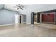 Open basement area featuring tile flooring, neutral walls and flexible design at 825 Highwater Pl, Fuquay Varina, NC 27526