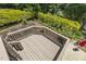Elevated wooden deck overlooking the backyard, offering space for relaxation and entertaining at 825 Highwater Pl, Fuquay Varina, NC 27526