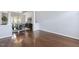 Bright dining area featuring hardwood floors and an elegant chandelier, ideal for Gathering gatherings at 825 Highwater Pl, Fuquay Varina, NC 27526