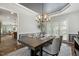 Elegant dining area with stylish lighting and decor, perfect for enjoying meals at 825 Highwater Pl, Fuquay Varina, NC 27526