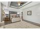 Spacious main bedroom with hardwood floors, trey ceiling and ensuite bathroom at 825 Highwater Pl, Fuquay Varina, NC 27526