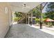 A backyard patio with a multi-level deck surrounded by nature and greenery at 825 Highwater Pl, Fuquay Varina, NC 27526