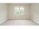 Neutral room with carpet and window to outside at 9020 Branch Creek Way, Apex, NC 27539