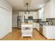 Spacious kitchen features an island, stainless steel appliances, and ample cabinetry at 9020 Branch Creek Way, Apex, NC 27539