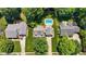 Aerial view of home featuring a beautiful backyard pool at 907 Stuart Dr, Mebane, NC 27302