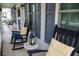 Inviting front porch with rocking chairs and charming decor at 907 Stuart Dr, Mebane, NC 27302