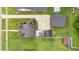 Aerial view showcasing a well-maintained property with lush greenery and ample parking at 9964 N Chestnut St, Middlesex, NC 27557