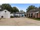 Spacious backyard with a gazebo, patio furniture, and well-manicured lawn at 9964 N Chestnut St, Middlesex, NC 27557