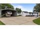 Large backyard with a storage shed, RV parking, gazebo, and mature trees at 9964 N Chestnut St, Middlesex, NC 27557