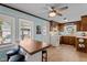 Bright eat-in kitchen featuring warm wood cabinets and plenty of natural light at 9964 N Chestnut St, Middlesex, NC 27557