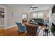 Cozy living room with hardwood floors, comfortable seating, and a decorative fireplace at 9964 N Chestnut St, Middlesex, NC 27557