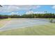Well-maintained tennis courts for recreational play and exercise at 100 Emory Bluffs Dr, Holly Springs, NC 27540