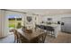 Dining area with seating for six, stainless appliances, granite countertops, and an open concept at 100 Reagan Crest Dr, Clayton, NC 27520